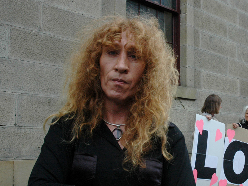Transgender woman Martine Delaney and protesters outside the Tasmanian Liberal headquarters in Hobart, Tuesday, March 14, 2006. Ms Delaney has lodged a complaint with the anti-discrimination commission against Liberal election material that claims same-sex marriage is "socially destructive change". She claims the material incites hatred against sexual and gender minorities. (AAP... 				</div>
						<a href=