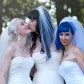 "Married lesbian threesome" having first child